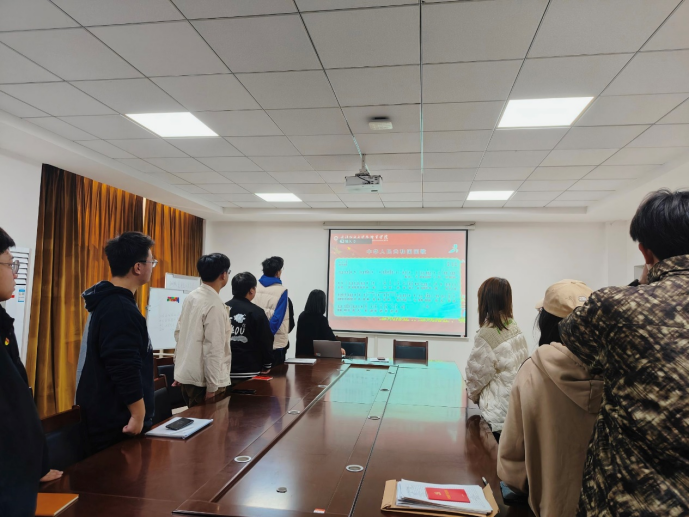 图一 第一党支部全体党员起立奏唱国歌.png 图一 第一党支部全体党员起立奏唱国歌.png